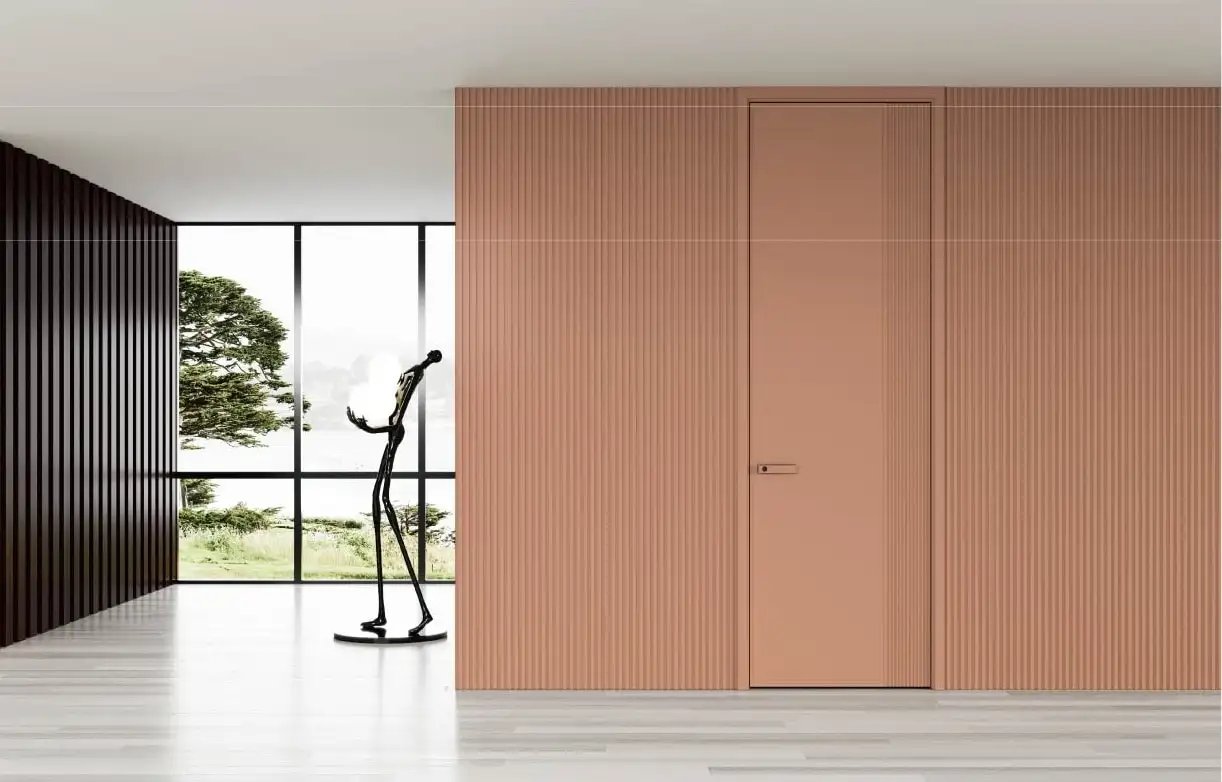 Terracotta painted wall paneling with a concealed flush door beside a window wall