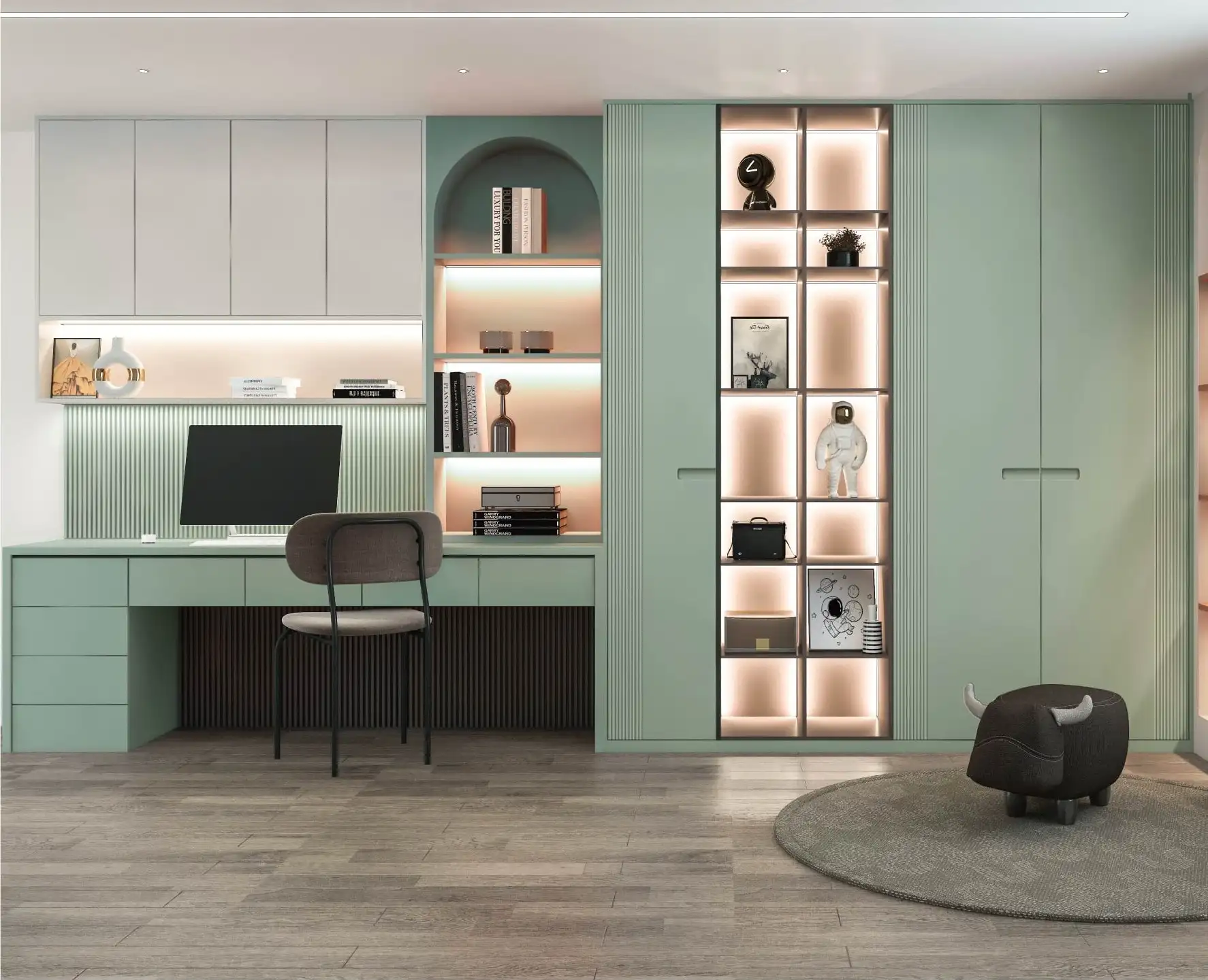 Sage green home office with a built-in desk, open shelving and lit display niches