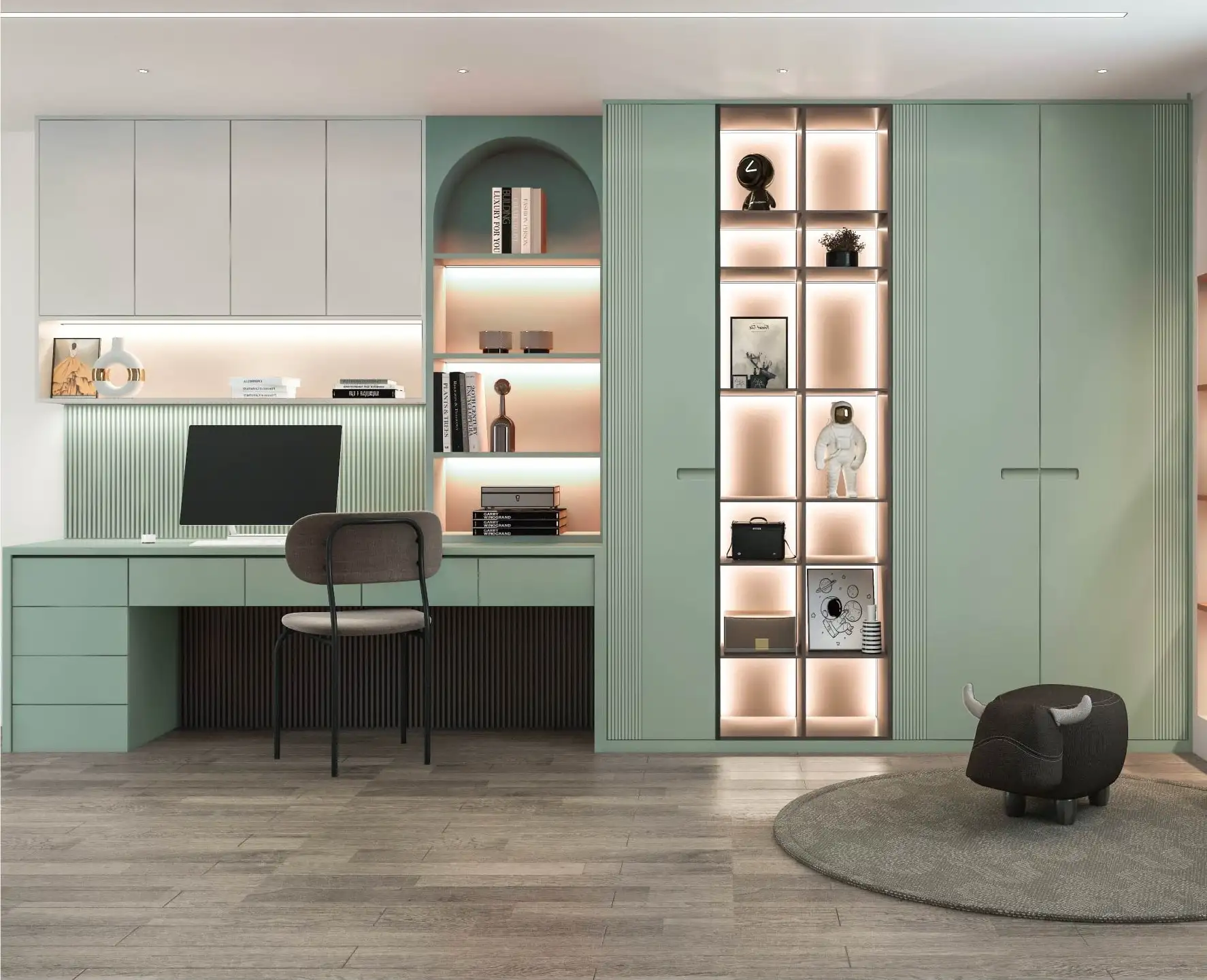 Sage green home office with a built-in desk, open shelving and lit display niches