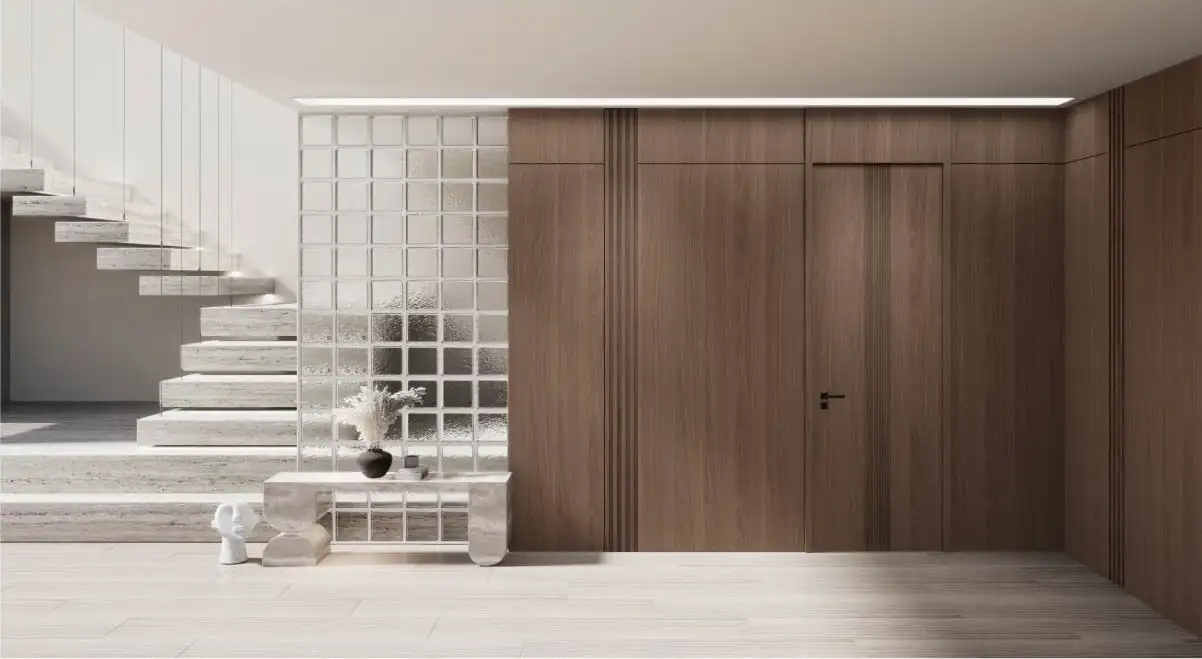 Walnut wall paneling with a flush door beside a staircase and glass block screen