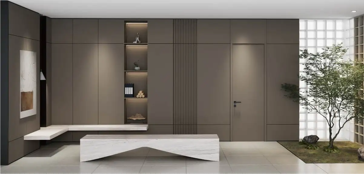 Taupe paneled wall with a flush door, recessed niche and stone bench seat