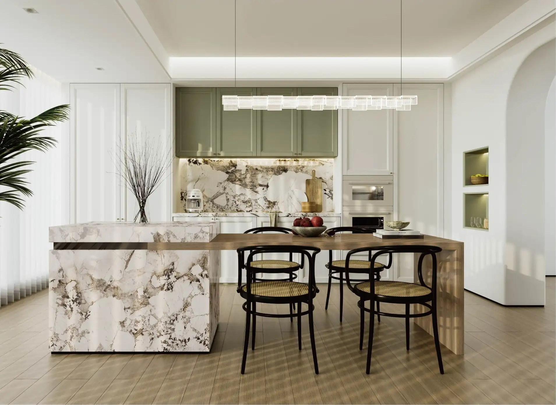 Kitchen with a bookmatched marble island, sage green cabinetry and a dining table