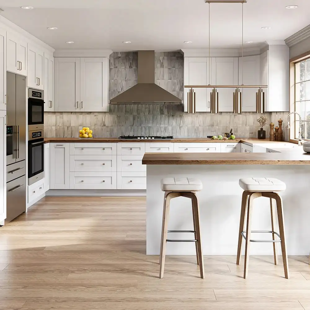 White shaker kitchen with a wood breakfast counter, stainless hood and stone backsplash